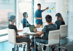 Sales recruitment strategy meeting with high-performing sales team
